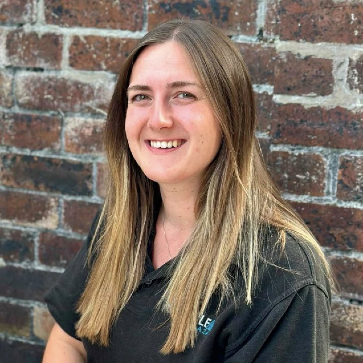 A headshot of Kate, founder of Pure Clean. About Us Page